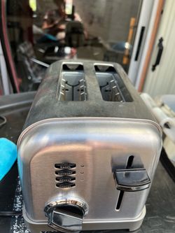 Toaster in good condition, clean, and with its tray