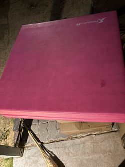 Kids gymnastics bar, beam, and mat