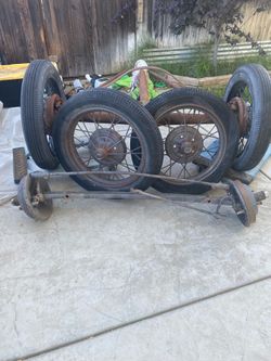 1931 ford suspension and wheels yard art