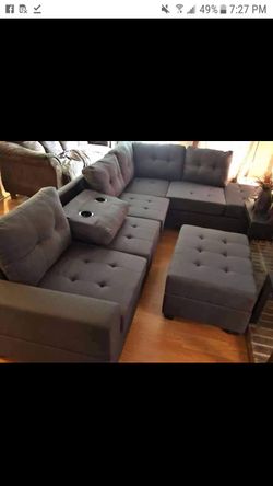 New dark grey sectional and ottoman