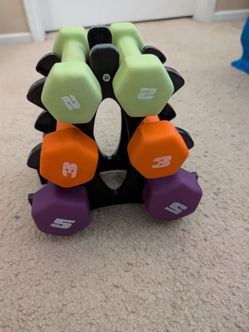Hand weights on rack, two 5 lb, two 3 lb, and two 2 lb weight