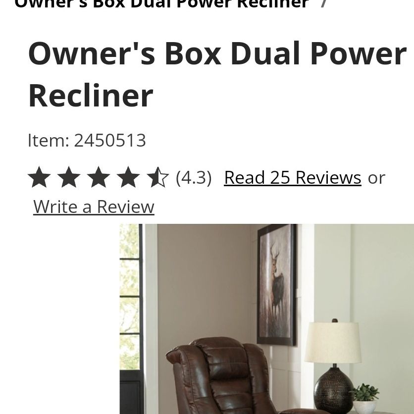 Ashley FURNITURE Brown Leather Recliner  $999.99 when purchased now selling $500 