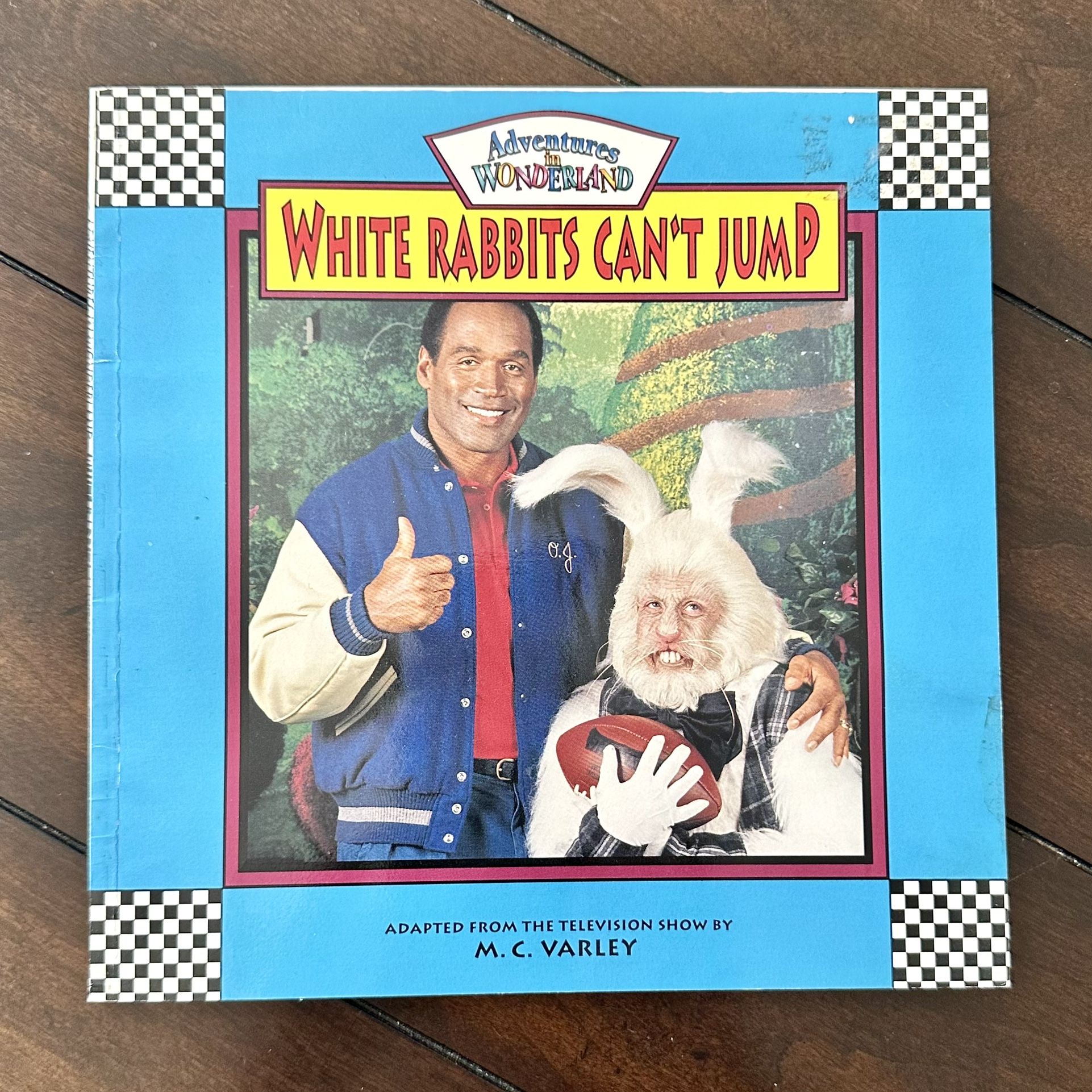 🐇 White Rabbits Can't Jump (Adventures in Wonderland) book - M.C. Varley with OJ Simpson