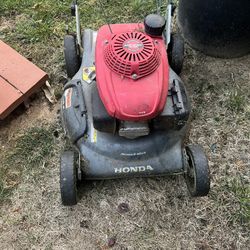 Running Honda Push Mower