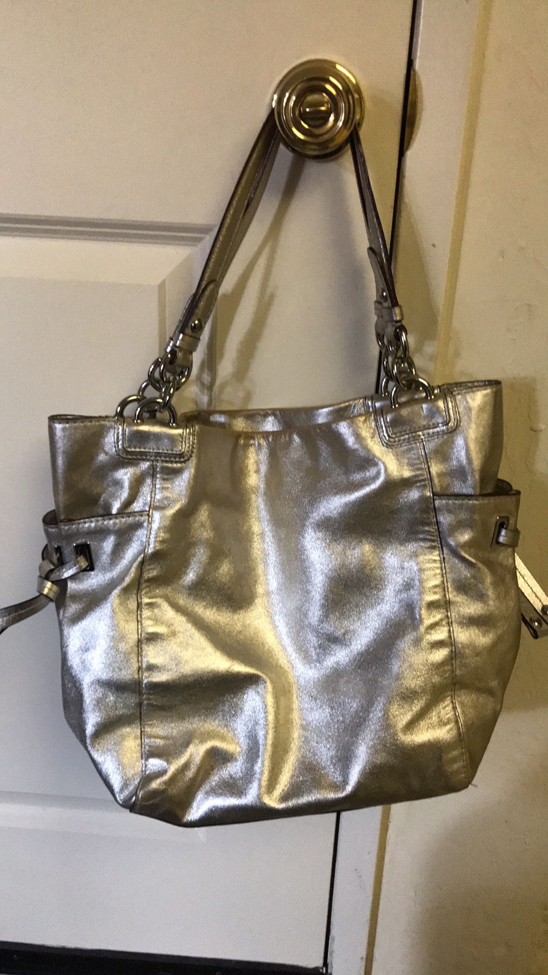Silver coach purse