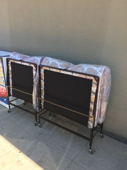 Twin rolls  a way bed frame solid metal new