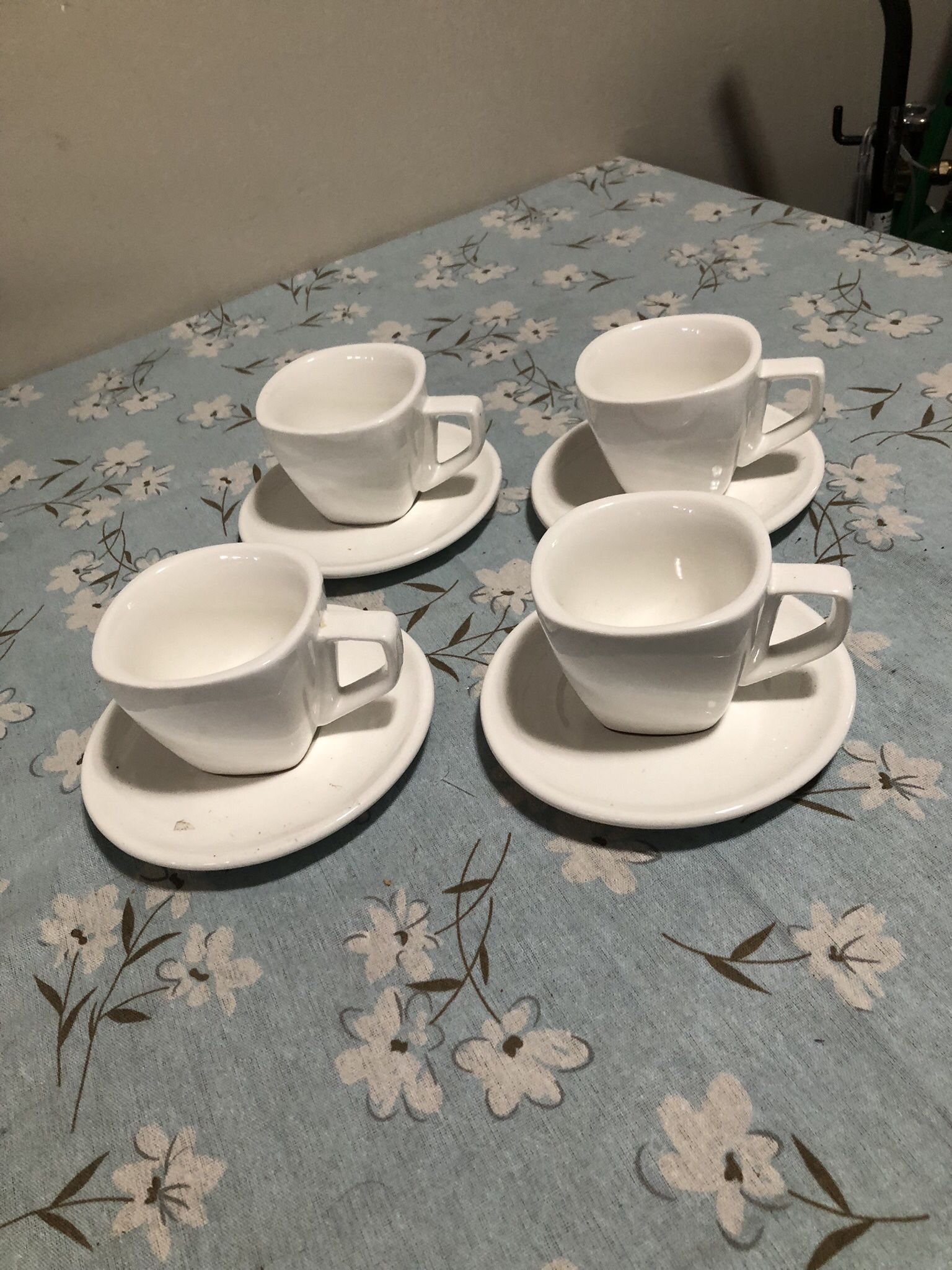 Four Cups And Saucers