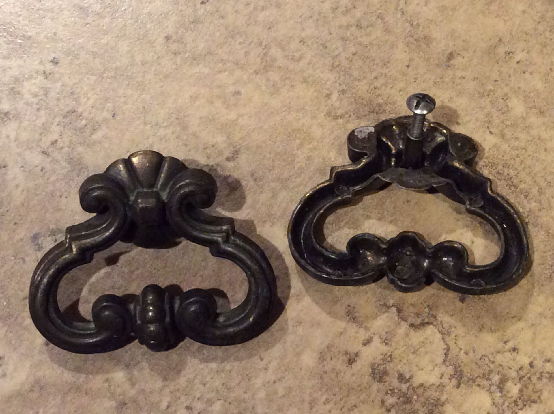 Ornate drawer pulls