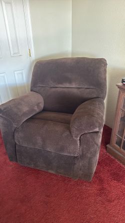 Brown fabric rocker recliner