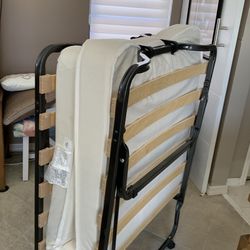 Twin rolling folding cot