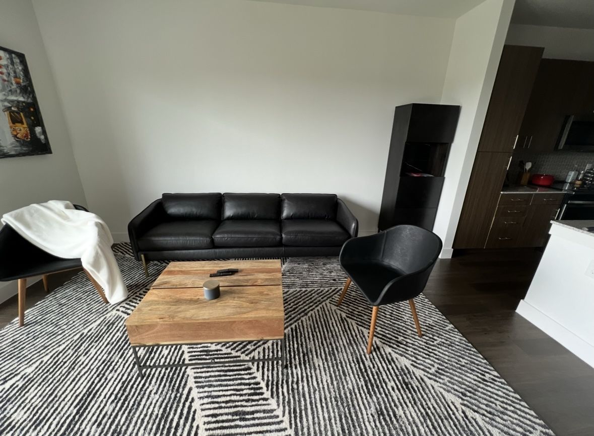 CB2 Black Accent Chairs With Wooden Legs