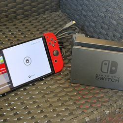 Nintendo Switch OLED (w/ Mario Red Joy-Cons + more)