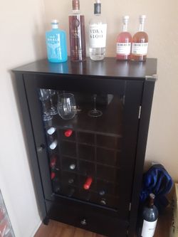 Wooden wine cabinet with drawers