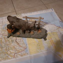 Cast Iron Farmer Milking Cow