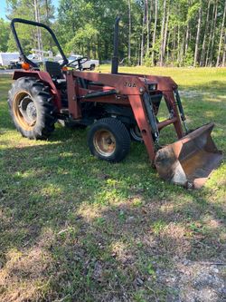 Case 245 farm tractor, with front end loader