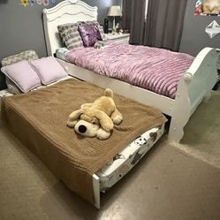 Girls Twin Bed With Trendal bed Undernieath 