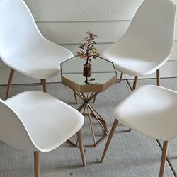 4 White Waterproof Chairs W/ Metal Legs And A Octogan Mirror Table 