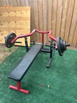 Weight bench with 110 pounds of weight