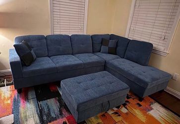 Blue microfiber sectional couch and ottoman
