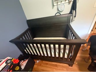 Brown baby crib