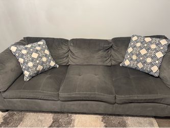 Grey couches w ottoman