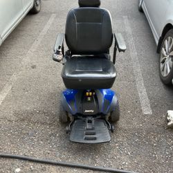Jazzy Electric scooter And A Portable Aluminum Wheelchair Ramp