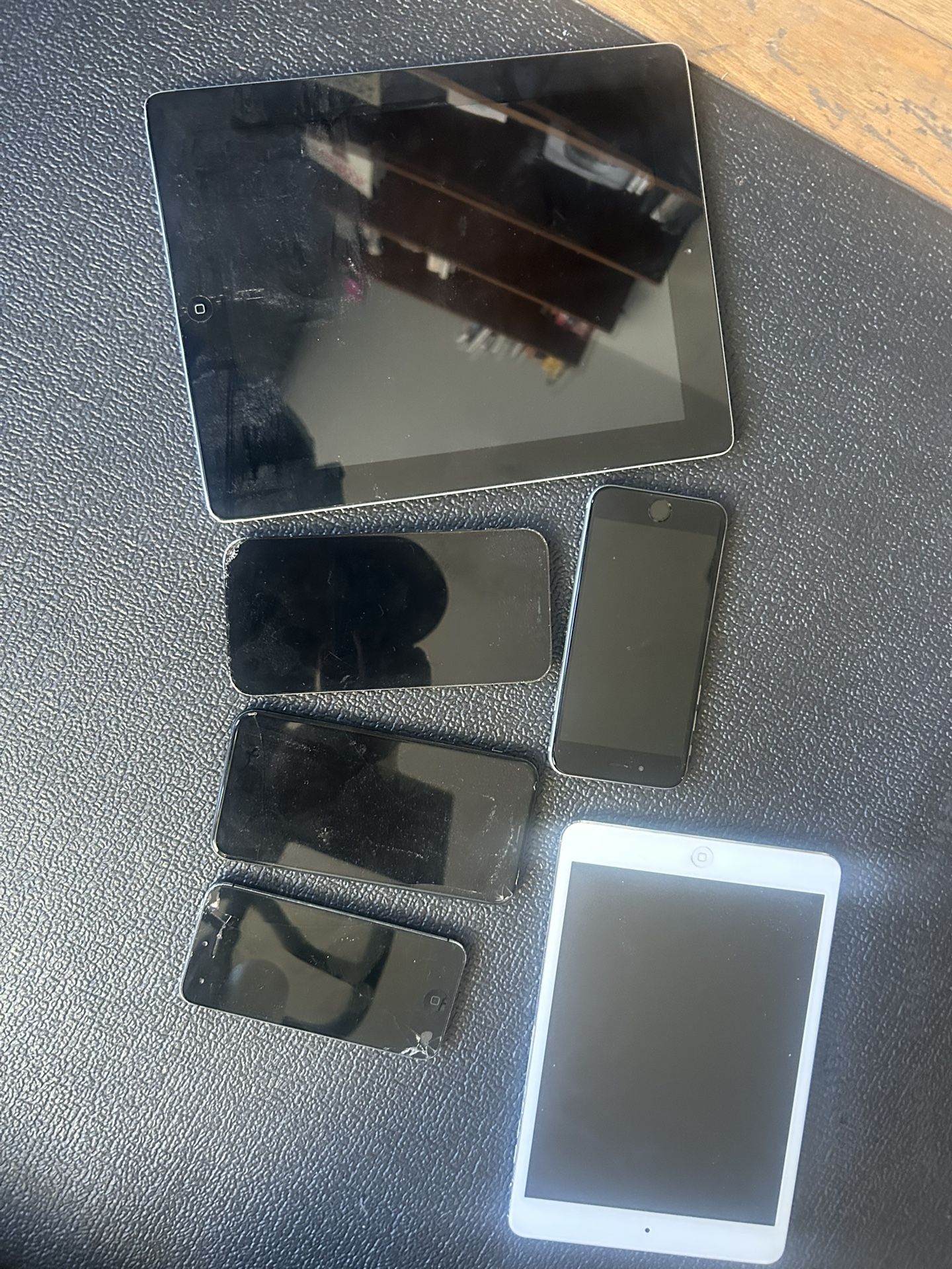 Few Old iPhones And iPads