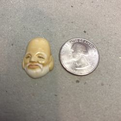 Carved asian male face 1 inch x 3/4 inch pendant