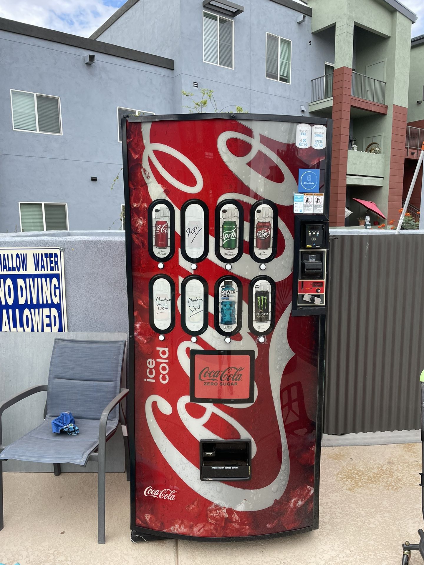 Vending Machines In Location At Busy Apartment Complex Near Pool for