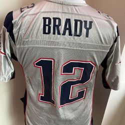 Collectible Tom Brady New England patriots jersey women’s and kids large (armpit to armpit is 14inches)Reebok . All proceeds go towards my cancer trea
