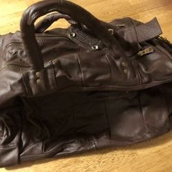 Brand new ox blood in color genuine leather traveling