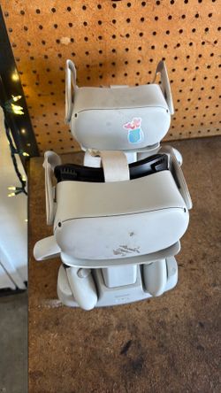 Two oculus headsets and stands