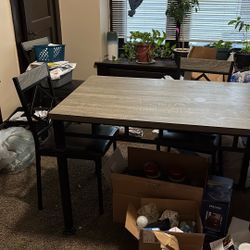Table is sturdy and 4 Chairs needs tightening