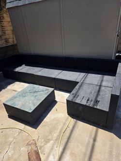 Outdoor Sectional Wicker Sofa with Table.