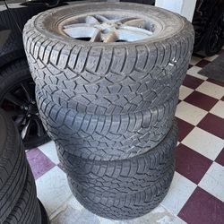 4 wheels and tires 285/60/18 40% tread left All Terrrains