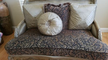 Sofa with a love set and one large table and two small tables