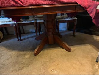 Table with leaf and four chairs
