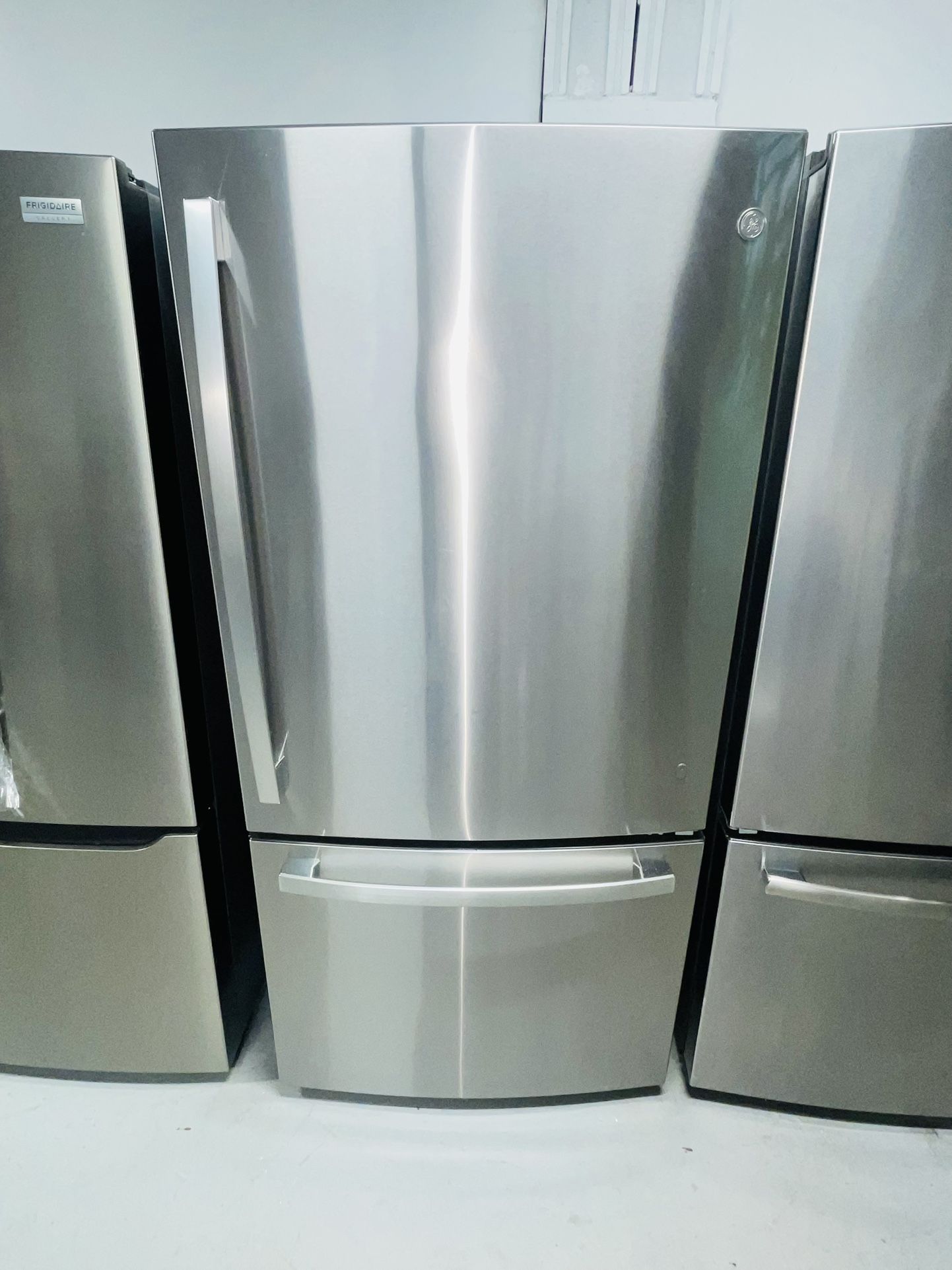 GE refrigerator stainless steel 33X69X27 a receipt for 90 days warranty