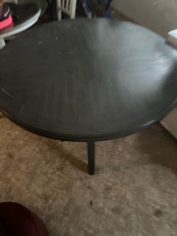 Round black wooden table