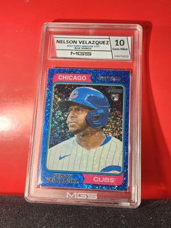2023 Topps Heritage Nelson Velazquez rookie card (#371), featuring the Blue Sparkle MGS 10 GEM MT