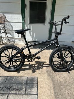 Mongoose Rebel Kids BMX Bike, 20-in. Wheels, Children & Tweens Ages 7-13, Black Bicycle