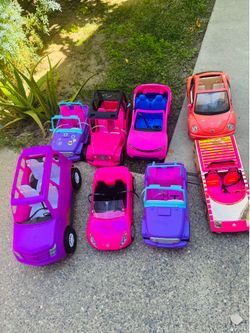 $7 Each Barbie car or $40 for all