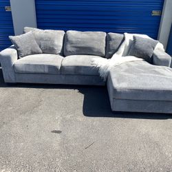 Grey L-shaped sectional by American furniture