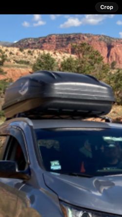 Large hard plastic roof cargo travel box, comes with 1 key and mounting brackets, no issues