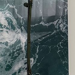 Single white decorative potted ochid with live succulents