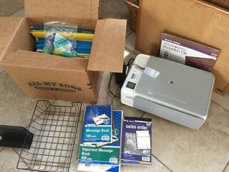 Printer with office supplies