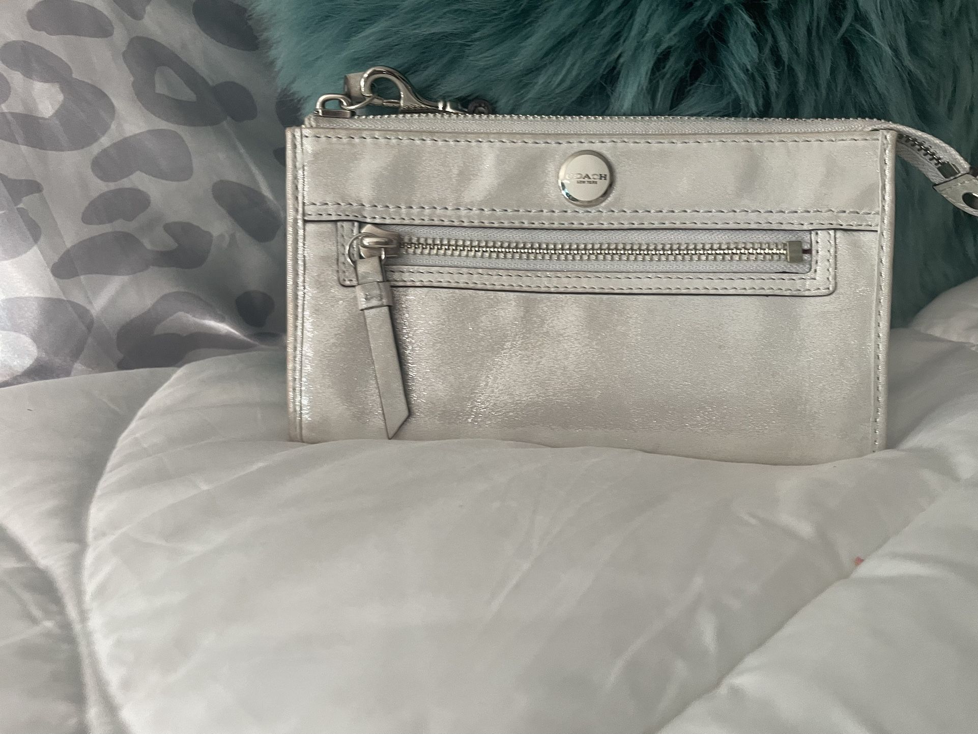 Coach, silver shiny wristlet