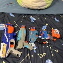 Assorted Nerf Guns With Bullets 