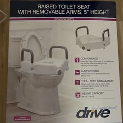 New Raised Toilet Seat