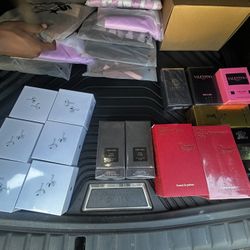 Colognes And AirPods With Clothing 
